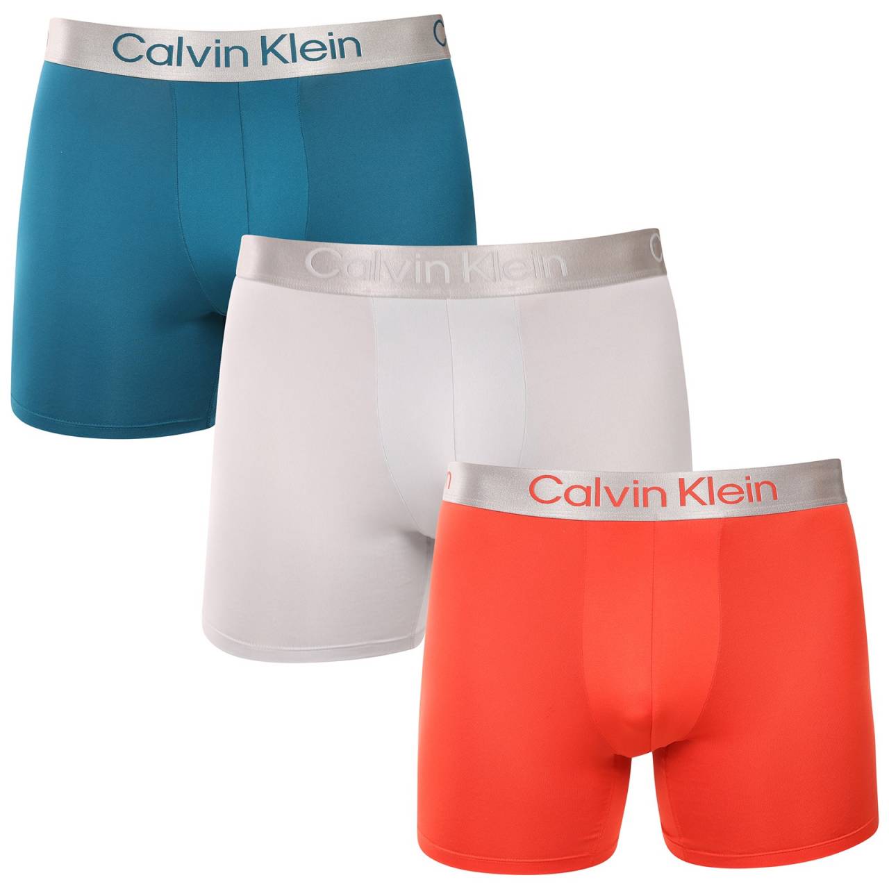 3PACK pánske boxerky Calvin Klein viacfarebné (NB4124-0HD) S, trenky.
Chcete boxerky, ktoré ponúkajú maximálne pohodlie, moderný dizajn a špičkovú kvalitu?
Prvotriedny materiál pre celodenné pohodlie
Tieto boxerky sú vyrobené z kombinácie polyesteru a elastanu, čo poskytuje dokonalú kombináciu mäkkosti, pružnosti a odolnosti.
Moderný dizajn a dokonalý strih
Minimalistický vzhľad s elastickým pásom dopĺňa logo Calvin Klein, ktoré dodáva boxerkám luxusný a sofistikovaný štýl.
Prečo si boxerky Calvin Klein zamilujete?

Ľahký a priedušný materiál: Ideálne na každodenné nosenie aj náročné športové aktivity.
Dlhšia nohavička: Poskytuje lepšie krytie a oporu, nezhrňuje sa a neškrtí.
Rýchloschnúce a odolné: Ideálne na aktívny životný štýl.
Nadčasový dizajn: minimalistický dizajn a luxusný vzhľad značky Calvin Klein.

Spodnú bielizeň Calvin Klein milujú ľudia na celom svete.
Pánska spodná bielizeň Calvin Klein patrí k stáliciam módneho priemyslu.
Ako sa starať o boxerky?
Aby si vaše boxerky zachovali dokonalý tvar a kvalitu čo najdlhšie, dodržiavajte tieto pokyny:

Praní: Doporučujeme prát na 30 °C s jemným pracím prostředkem.
Žehlení: Nedoporučuje se, aby nedošlo k poškození materiálu.
Sušenie: Sušenie v sušičke sa neodporúča, radšej sušte voľne na vzduchu.

Tip: Nájsť ten správny kus spodnej bielizne, ktorý vám dokonale padne, môže byť náročné.