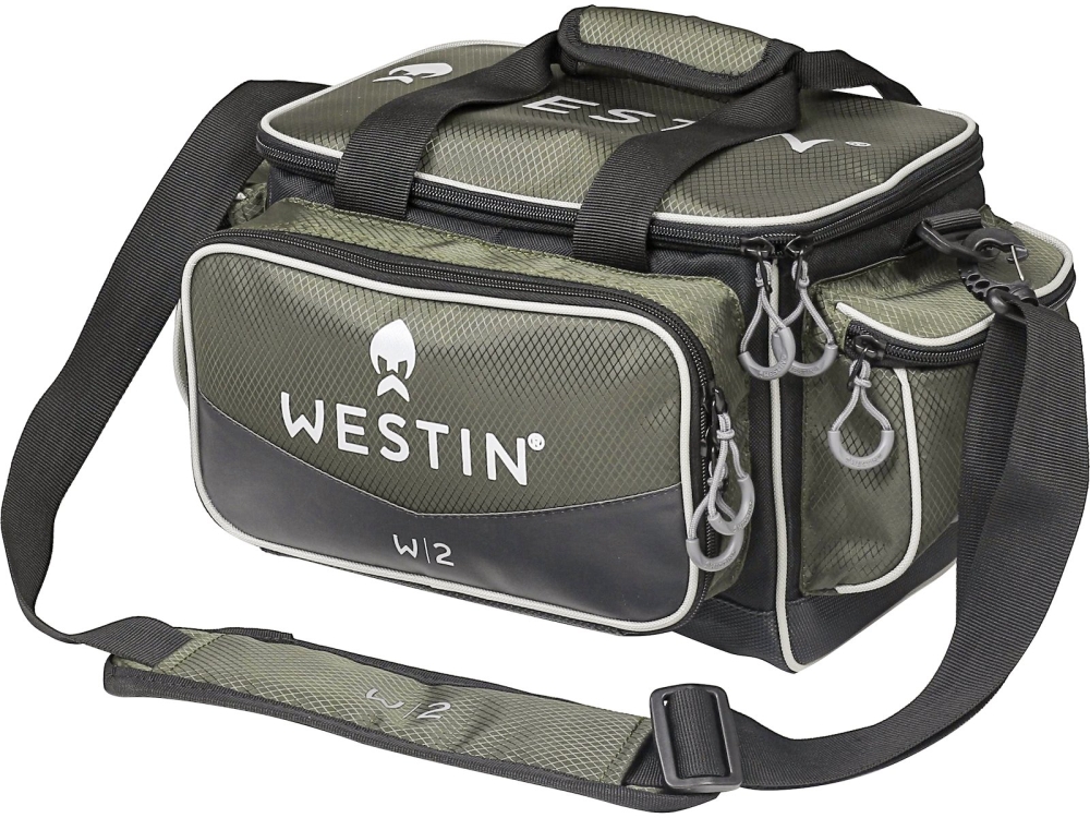Westin taška w2 lure bag 3 boxes forest night - small.
 •Rozmery: Malá: 43 x 25 x 22 cm / Veľká: 55 x 31 x 25 cm •Hlavný materiál: Diamantovo tkaný polyester / 600D čierny polyester s povrchovou úpravou •Malá (Small): Obsahuje tri originálne Westin krabičky na náradie B02-706-027 (27,5 x 18,5 x 4,5 cm) Veľká (Large): Obsahuje dve originálne Westin krabičky na náradie B02-706-037 (36 x 22 x 4,8 cm) a jednu krabičku na náradie Westin B02-706-036 (36 x 22 x 8 cm) 
 •Vodeodolné materiály •Dve veľké bočné vrecká na nástroje a príslušenstvo • Jedno veľké predné vrecko •Polstrovaná rukoväť na nosenie a polstrovaný ramenný popruh •Spevnené a vodeodolné dno