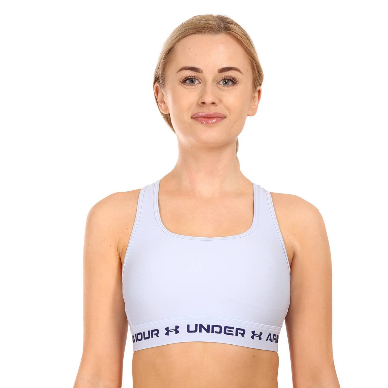 Dámska podprsenka Under Armour modrá (1361034 438) M.
Hľadáte športovú podprsenku, ktorá udrží krok s vaším tempom?
Funkčný materiál, ktorý dýcha spolu s vami
Ľahký a rýchloschnúci materiál s technológiou HeatGear® odvádza pot a udržuje vás v suchu, aj keď tvrdo trénujete.
Športový strih s prekríženými ramienkami
Vďaka elastickému spodnému pásu s minimalistickým logom Under Armour zostane dokonale na svojom mieste.
Prečo si podprsenku Under Armour zamilujete

Rýchloschnúci funkčný materiál, ktorý odvádza pot.
Štýlový športový dizajn s krížovým zadným dielom, bezšvové vyhotovenie bez kostice.
Značková kvalita od spoločnosti Under Armour.

Spodná bielizeň Under Armour, ktorá vás podporí pri akejkoľvek aktivite
Spodná bielizeň Under Armour je navrhnutá tak, aby vám umožnila podať životný výkon - a nezáleží na tom, či sa chystáte na horský výstup alebo náročné pracovné stretnutie.
Ako sa starať o športovú podprsenku Under Armour
Aby vám obľúbená športová podprsenka dlho vydržala v perfektnom stave, odporúčame vám dodržiavať tieto pokyny.

Pranie: Per na 30 ° C, ideálne v ochrannom sáčku a bez aviváže.
Sušenie: Môžeš sušiť v sušičke na nízku teplotu, ale odporúčame sušenie na vzduchu, ktoré predĺži životnosť elastických vlákien.
Žehlenie: Nežehliť – funkčný materiál nie je určený na žehlenie a mohlo by dôjsť k poškodeniu.

Tip: Staňte sa expertom na údržbu spodnej bielizne vďaka radám v našom článku a doprajte svojim obľúbeným kúskom starostlivosť, ktorú si zaslúžia.