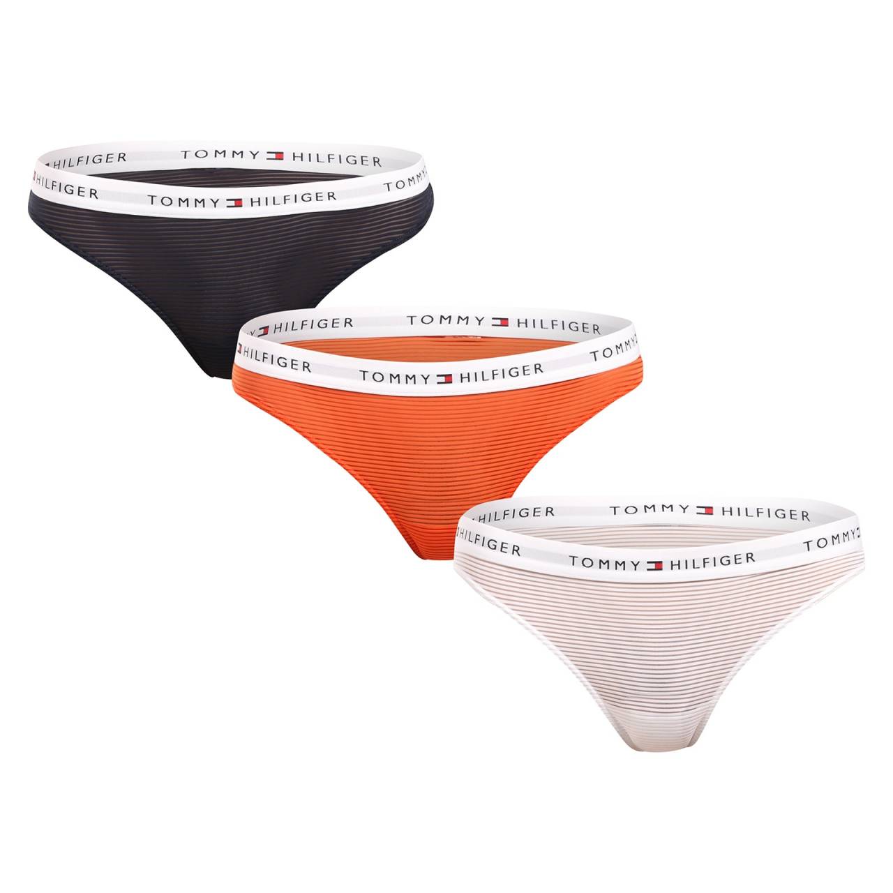 3PACK dámske tangá Tommy Hilfiger viacfarebná (UW0UW05532 0VE) XS.
Doprajte si luxusný pocit každý deň s dámskymi tangami Tommy Hilfiger.
Ľahký a hebký materiál pre maximálne pohodlie
Tanga Tommy Hilfiger sú vyrobené z mäkkého umelého vlákna, ktoré je ľahké, priedušné a príjemné na telo.
Nadčasový štýl s ikonickým podpisom
Tieto tangá vás nadchnú svojím čistým, elegantným a dokonale univerzálnym dizajnom.
Prečo si tangá Tommy Hilfiger zamilujete

Elegantný dizajn s jemnou značkovou gumou.
Mäkký, ľahký a pohodlný materiál.
Perfektný strih, ktorý sa neprejavuje pod oblečením.
Ideálna kombinácia štýlu a pohodlia.

Tommy Hilfiger je značka pre všetky moderné ženy.
Spodná bielizeň Tommy Hilfiger predstavuje dokonalú harmóniu medzi klasickým a moderným vzhľadom.
Ako sa starať o tangá Tommy Hilfiger
Aby vaša obľúbená spodná bielizeň dlho vyzerala ako nová, odporúčame vám dodržiavať tieto zásady starostlivosti.

Pranie: Per pri maximálnej teplote 30 °C, ideálne v ochrannom sáčku.
Sušenie: Nesuš v sušičke – horúci vzduch by mohol poškodiť vlákna a gumu.
Žehlenie: Áno, ale opatrne – na nízku teplotu a ideálne cez ochrannú látku, aby nedošlo k poškodeniu povrchu.

Tip: Vaša obľúbená spodná bielizeň si zaslúži šetrné zaobchádzanie.