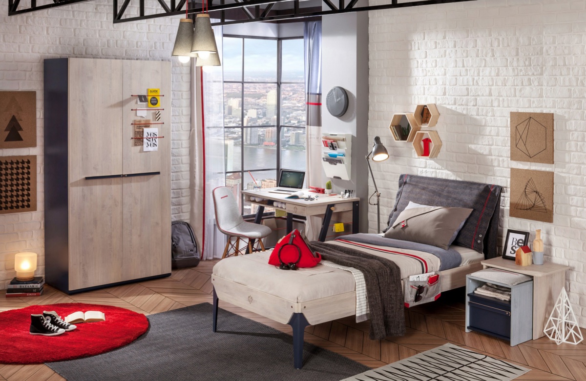 Moderná študentská izba lincoln - dub/dub modrý/tmavo modrá.

 

Prednosťou izby je posteľ, ktorej zadné čelo je čalúnené a súčasťou je obojstranný vankúš, ktorý sa k čelu prichytáva pomocou suchého zipsu.

 

Vedľa postele je praktický nočný stolík, ktorý sa jednoducho rozloží na taburet a jedná sa tak o multifunkčný nábytok.

 

Moderná študentská izba Lincoln sa skladá z týchto prvkov:


	Študentská posteľ 100x200cm s vankúšom Lincoln - 109x102x214cm (š, v, h)
	Malý študentský písací stôl Lincoln - 114x76x64cm (š, v, h)
	Nočný stolík 2v1 Lincoln - 55x48,6x41,5cm (š, v, h)
	Dvojdverová šatníková skriňa Lincoln - 101x203,5x54,5cm (š, v, h)


 

Všetok nábytok patriaci do kolekcie Lincoln nájdete nižšie v súvisiacich produktoch.