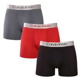 3PACK pánske boxerky Calvin Klein viacfarebné (NB4124-0GU) M, trenky.
Chcete boxerky, ktoré ponúkajú maximálne pohodlie, moderný dizajn a špičkovú kvalitu?
Prvotriedny materiál pre celodenné pohodlie
Tieto boxerky sú vyrobené z kombinácie polyesteru a elastanu, čo poskytuje dokonalú kombináciu mäkkosti, pružnosti a odolnosti.
Moderný dizajn a dokonalý strih
Minimalistický vzhľad s elastickým pásom dopĺňa logo Calvin Klein, ktoré dodáva boxerkám luxusný a sofistikovaný štýl.
Prečo si boxerky Calvin Klein zamilujete?

Ľahký a priedušný materiál: Ideálne na každodenné nosenie aj náročné športové aktivity.
Dlhšia nohavička: Poskytuje lepšie krytie a oporu, nezhrňuje sa a neškrtí.
Rýchloschnúce a odolné: Ideálne na aktívny životný štýl.
Nadčasový dizajn: minimalistický dizajn a luxusný vzhľad značky Calvin Klein.

Spodnú bielizeň Calvin Klein milujú ľudia na celom svete.
Pánska spodná bielizeň Calvin Klein patrí k stáliciam módneho priemyslu.
Ako sa starať o boxerky?
Aby si vaše boxerky zachovali dokonalý tvar a kvalitu čo najdlhšie, dodržiavajte tieto pokyny:

Praní: Doporučujeme prát na 30 °C s jemným pracím prostředkem.
Žehlení: Nedoporučuje se, aby nedošlo k poškození materiálu.
Sušenie: Sušenie v sušičke sa neodporúča, radšej sušte voľne na vzduchu.

Tip: Nájsť ten správny kus spodnej bielizne, ktorý vám dokonale padne, môže byť náročné.