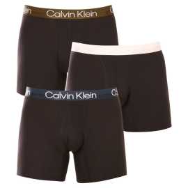 3PACK Moške boksarice Calvin Klein črne (NB2971A-GZ5) XL.
Privoščite si ikonični slog in neprekosljivo udobje z moškimi boksericami Calvin Klein v brezčasnih barvah.
Sodobni materiali za največje udobje
Te boksarice so izdelane iz mešanice bombaža in umetnih vlaken.
Elegantna in funkcionalna zasnova za vsak dan
Elegantno obliko dopolnjuje tkan elastični trak s subtilnim logotipom Calvin Klein.
Zakaj ne smete zamuditi boksaric Calvin Klein

Mešanica bombaža in umetnih vlaken: Idealno razmerje med udobjem, vzdržljivostjo in prilagodljivostjo.
Eleganten videz s subtilnim logotipom Calvin Klein: Elegantna podlaga za vašo obleko.
Daljše noge in elastičen pas: Popolnoma se prilega in ostane na mestu brez neprijetnega zategovanja.

Spodnje perilo Calvin Klein obožujejo ljudje po vsem svetu
Moško spodnje perilo Calvin Klein je ena od stalnic modne industrije.
Kako skrbeti za boksarice Calvin Klein
Če želite, da bodo vaše najljubše boksarice dolgo ostale v odličnem stanju, vam priporočamo naslednje nasvete za vzdrževanje.

Pralnica: Per pri 30 °C.
Sušenje: Bokserje lahko sušite v sušilnem stroju, vendar priporočamo nizko temperaturo, da podaljšate življenjsko dobo elastičnih vlaken.
Likanje: Ni potrebna in ni priporočljiva.

Nasvet: Iskanje pravega spodnjega perila, ki se vam popolnoma prilega, je lahko izziv.