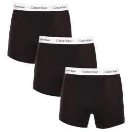 3PACK Moške boksarice Calvin Klein črne (U2662G-001) XL.
Ta komplet črnih moških boksaric Calvin Klein združuje sodobno obliko in vrhunsko kakovost.
Stil, kakovost in udobje v bokserkah Calvin Klein
Boksarice so izdelane iz bombaža s primesjo elastana, ki zagotavlja mehkobo in zračnost materiala ter elastičnost, zaradi česar se boksarice odlično prilagajajo telesu.
Sodobno zasnovo boksaric Calvin Klein bo cenil vsak eleganten moški.
Bokserice Calvin Klein imajo daljše noge in klasično črno zasnovo, ki jo dopolnjuje tkan elastični trak v beli barvi z minimalističnim logotipom.
Razlogi, zakaj vam bodo te bokserice všeč

Material, kidiha: Bombaž zagotavlja udobje in odvaja vlago, kar zagotavlja prijetno počutje ves dan.


Prožnost zaradi elastana: Bokserice se prilagajajo obliki vašega telesa in ne omejujejo gibanja.


Elegantna tkana guma: Elastičen logotip Calvin Klein daje bokserkam sodoben videz in nepogrešljiv slog.

Spodnje perilo Calvin Klein obožujejo ljudje po vsem svetu
Moško spodnje perilo Calvin Klein je ena od stalnic modne industrije.
Kako skrbeti za boksarice Calvin Klein
Če želite zagotoviti, da bodo vaše bokserice čim dlje v odličnem stanju, upoštevajte te smernice:

Pralnica: Perite pri 30 °C z blagimi detergenti, da ohranite mehkobo bombaža.


Sušenje: Lahko se varno posuši v sušilnem stroju pri nizkih temperaturah.


Likanje: Bokserjev ni treba likati.

Nasvet: Iskanje pravega spodnjega perila, ki se vam popolnoma prilega, je lahko izziv.