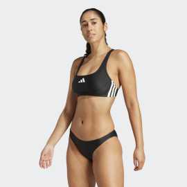 adidas 3 Stripes V-BACK BIKINI 42. Športová atmosféra, ktorá patrí na pláž Zažiarte pri bazéne aj na piesku v týchto bikinách adidas . Tento dvojdielny set inšpirovaný ikonickým dedičstvom značky prináša čistý športový štýl a sebavedomý vzhľad. Vďaka charakteristickým 3 prúžkom je jasné, komu fandíte - pohodlie a dizajn.Spodný diel so stredne vysokým elastickým pásom skvelepadne a zostane na svojom mieste, či už plávate, opaľujete sa alebo hráte plážový volejbal. Výhody  Ikonické 3 prúžky - pre výrazný štýl adidas. Stredne vysoký pás - pre pohodlie a istotu. Ideálny športový strih - na pláž alebo do bazéna. Pohodlný materiál - ktorý drží tvar.   Štýl, ktorý hovorí za vás - aj bez slov.